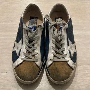 Blue, yellow, and white golden goose sneakers